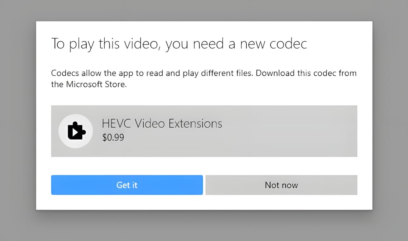 Windows Photos app displaying 'The HEVC Video Extension is required to display this file' error message